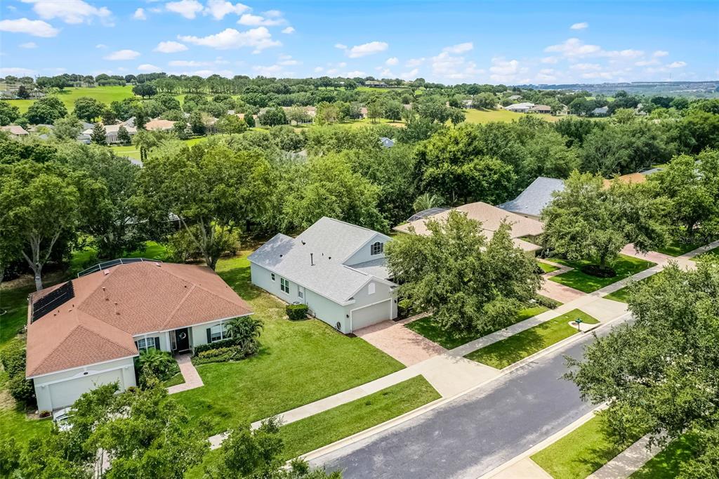 1124 Hidden Bluff Clermont, FL 34711 - Photo 25 of 25 an aerial view of a house with garden space and street view