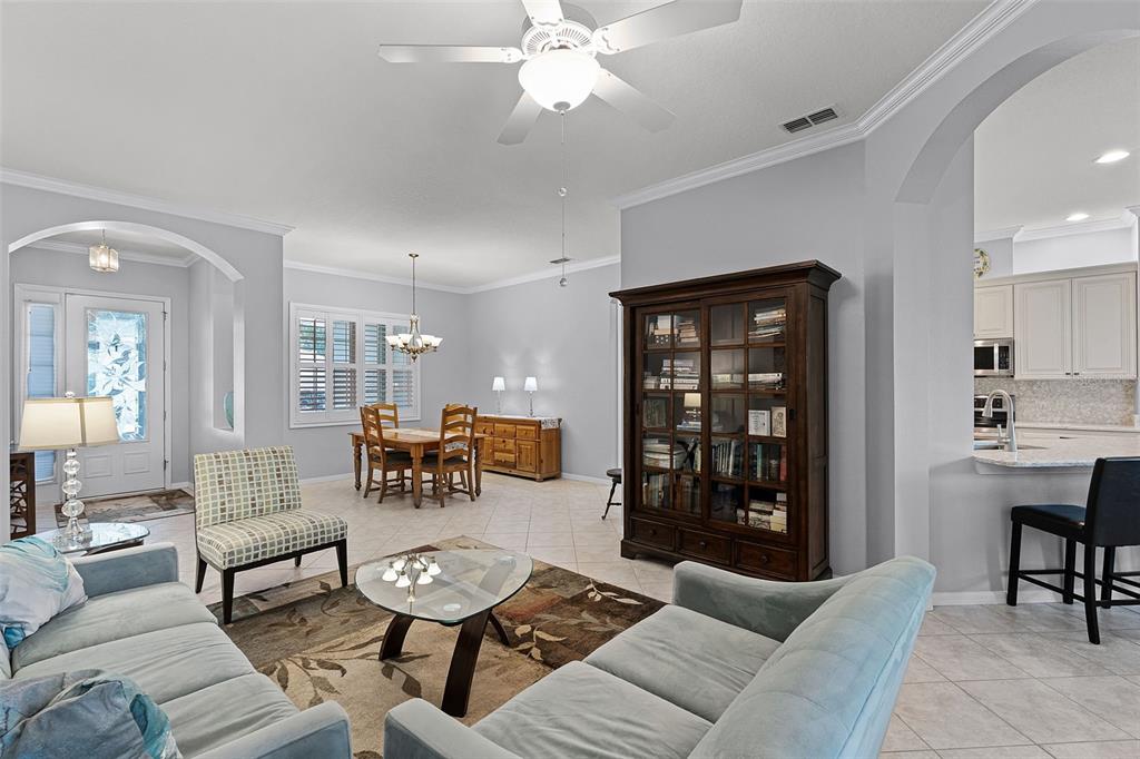 1124 Hidden Bluff Clermont, FL 34711 - Photo 6 of 25 a living room with furniture and wooden floor