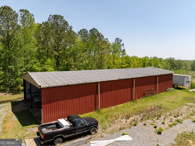 a view of outdoor space with deck and barbeque oven