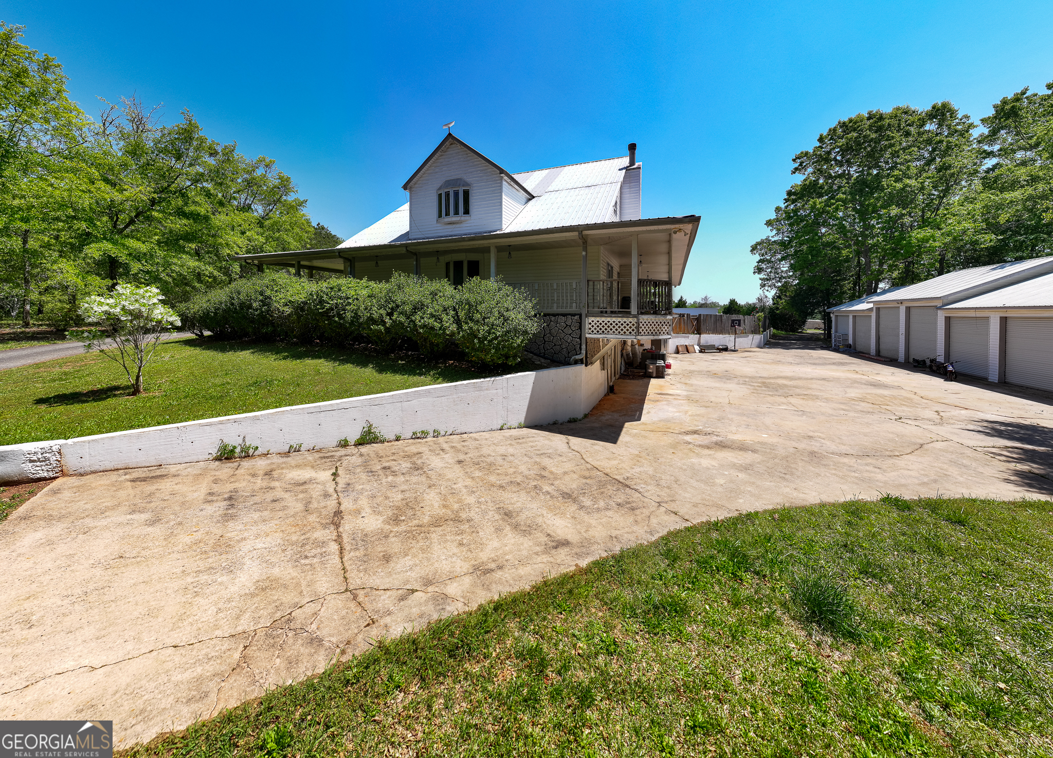1755 Hunsinger Road Shiloh, GA 31826 - Photo 2 of 62 a view of a house with a yard and potted plants
