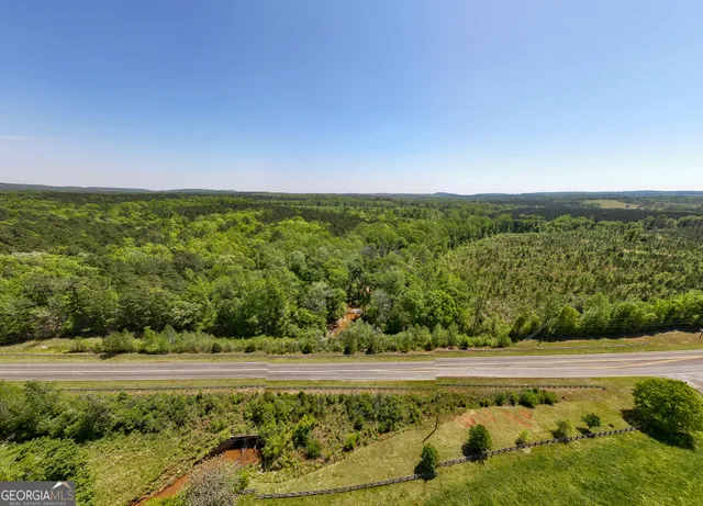 a view of a lake with a city