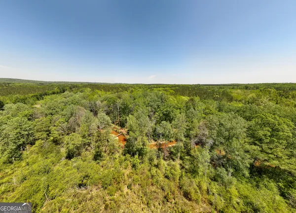 a view of a swimming pool and an outdoor space