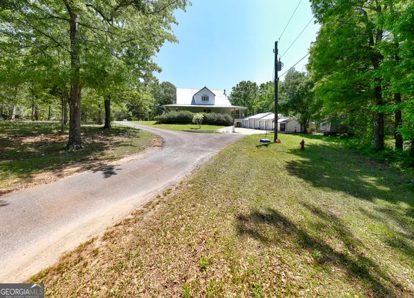 a view of a yard with a trees