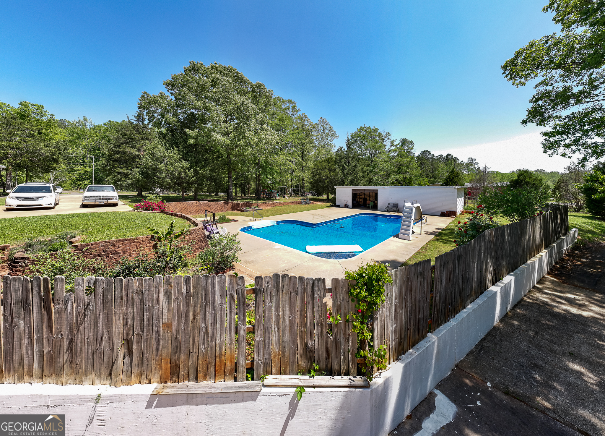 1755 Hunsinger Road Shiloh, GA 31826 - Photo 7 of 62 a view of a backyard with wooden fence