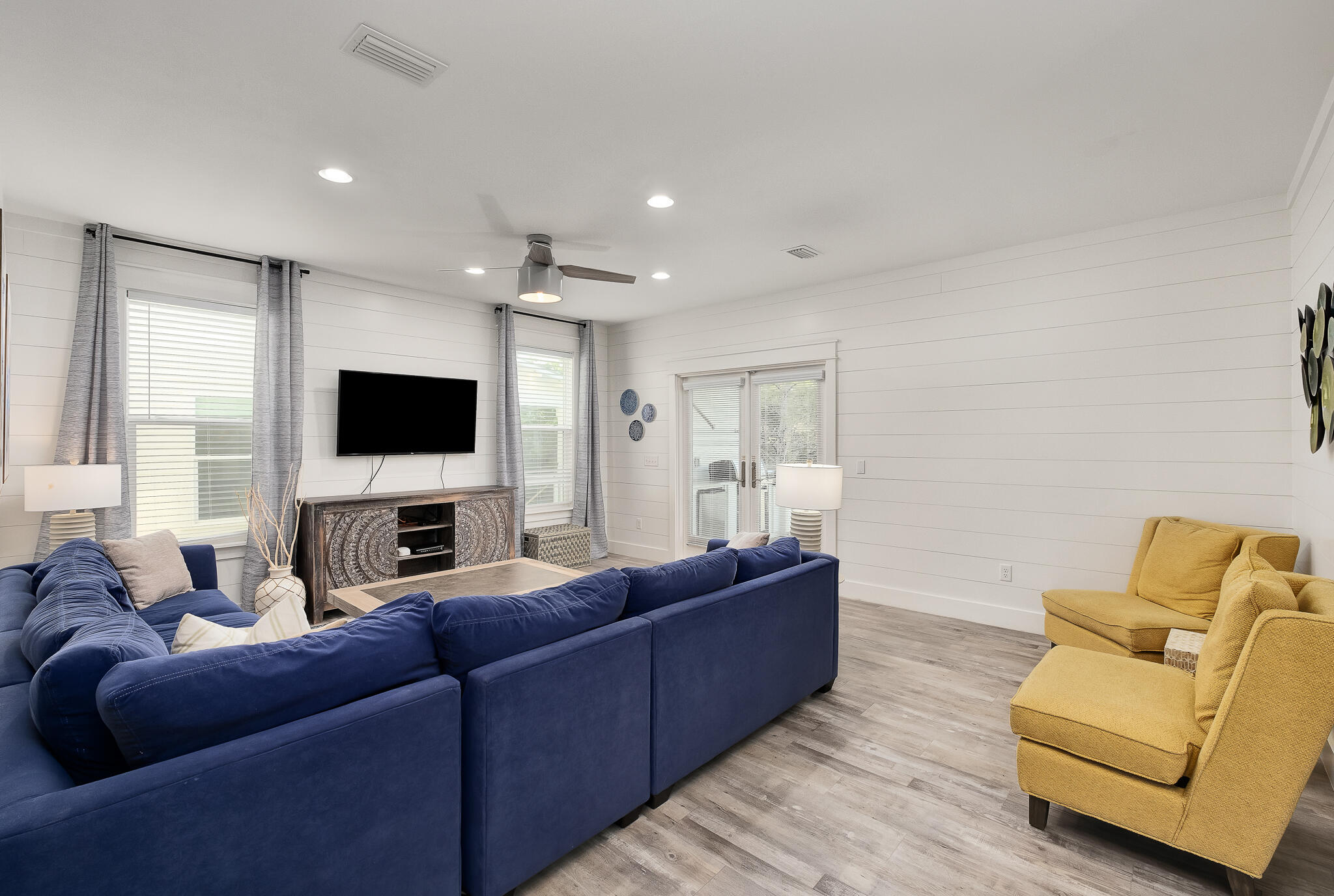 66 Seabreeze Trail Inlet Beach, FL 32461 - Photo 11 of 59 a living room with furniture and a flat screen tv