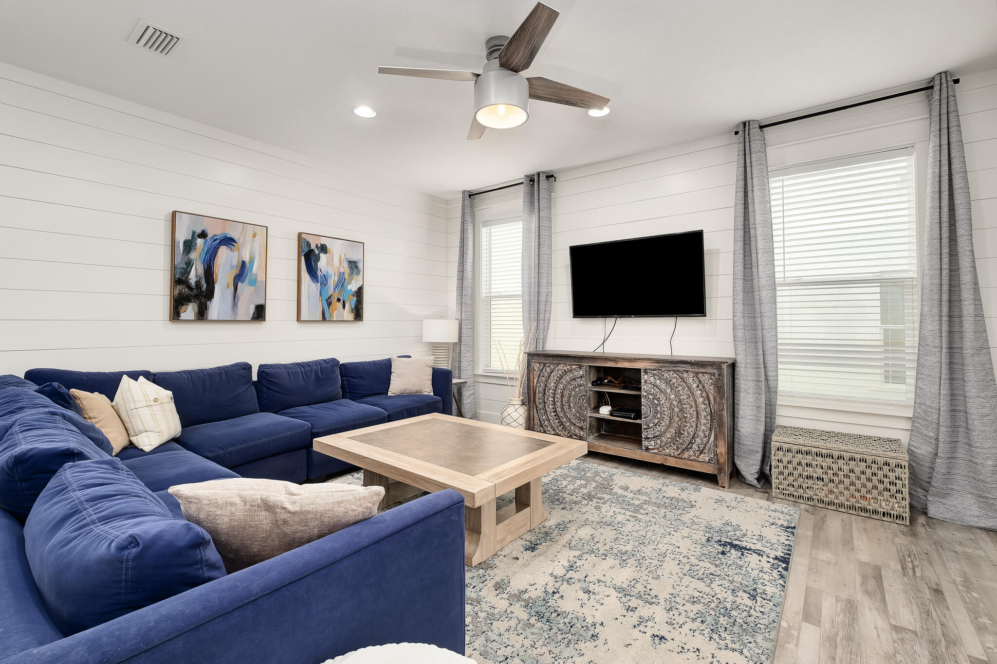 66 Seabreeze Trail Inlet Beach, FL 32461 - Photo 12 of 59 a living room with furniture and a flat screen tv