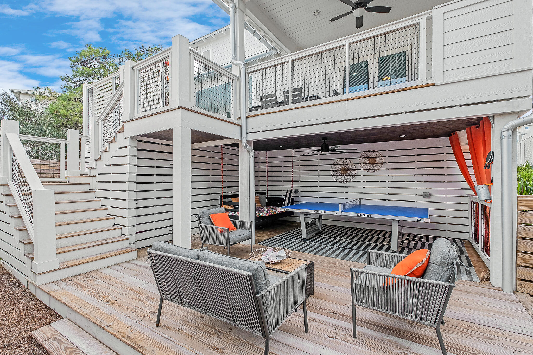 66 Seabreeze Trail Inlet Beach, FL 32461 - Photo 20 of 59 a view of a roof deck with wooden floor and fence
