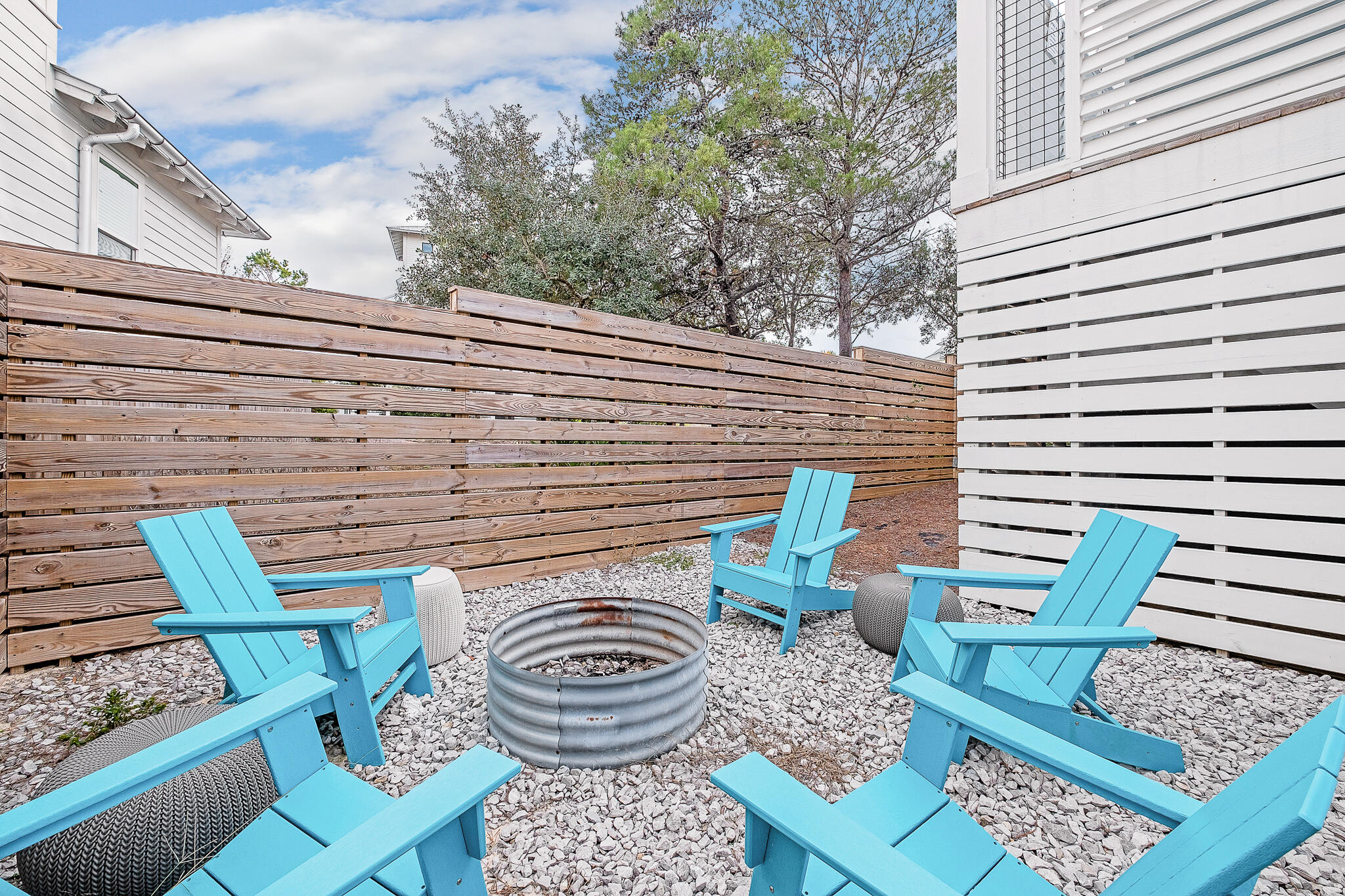 66 Seabreeze Trail Inlet Beach, FL 32461 - Photo 22 of 59 a view of a chairs and table in the patio