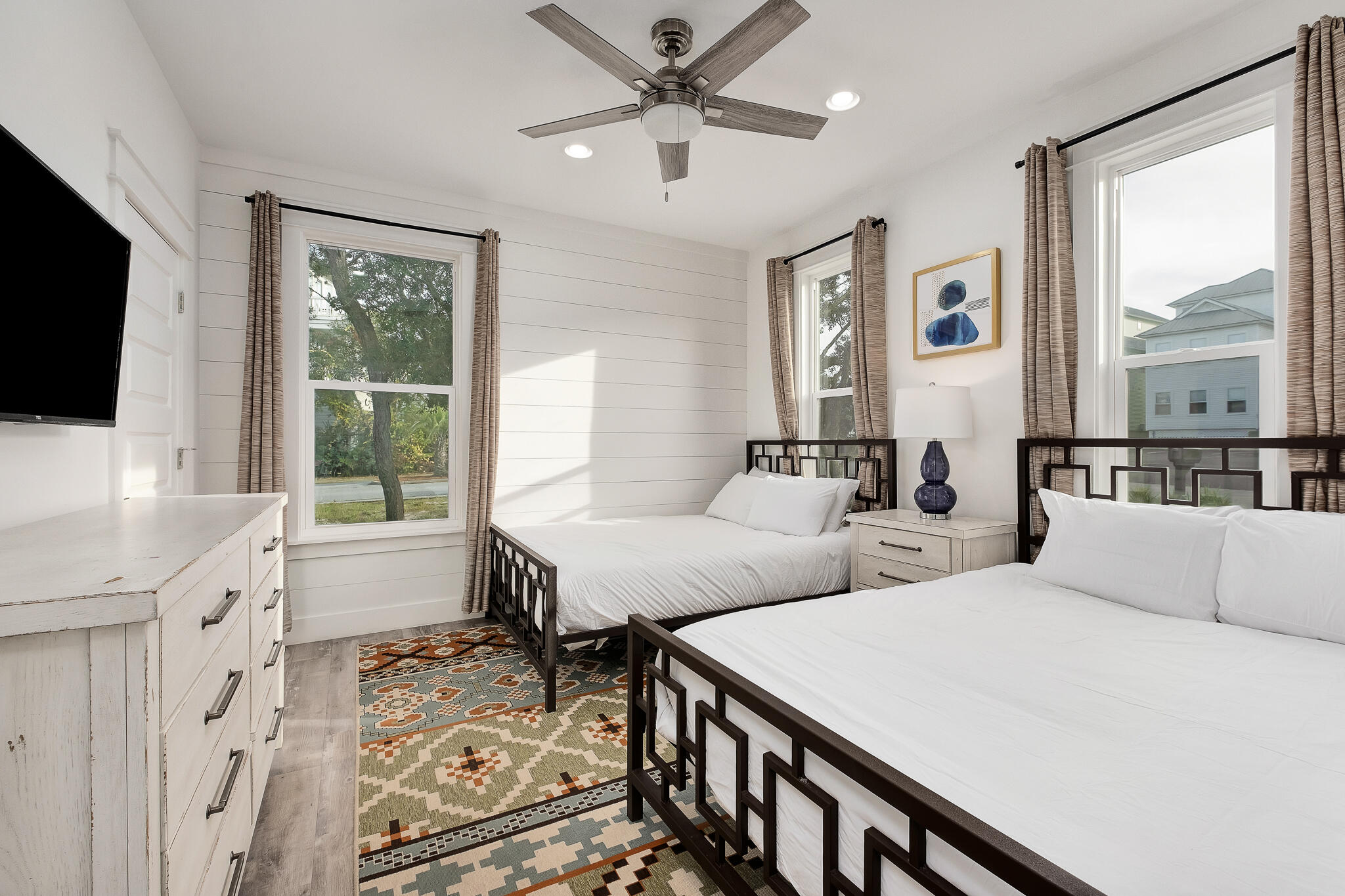 66 Seabreeze Trail Inlet Beach, FL 32461 - Photo 23 of 59 a spacious bedroom with two beds and a large window