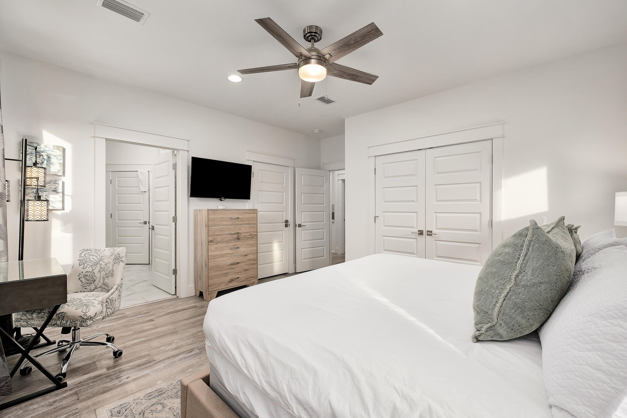 66 Seabreeze Trail Inlet Beach, FL 32461 - Photo 27 of 59 a spacious bedroom with a bed and a flat screen tv