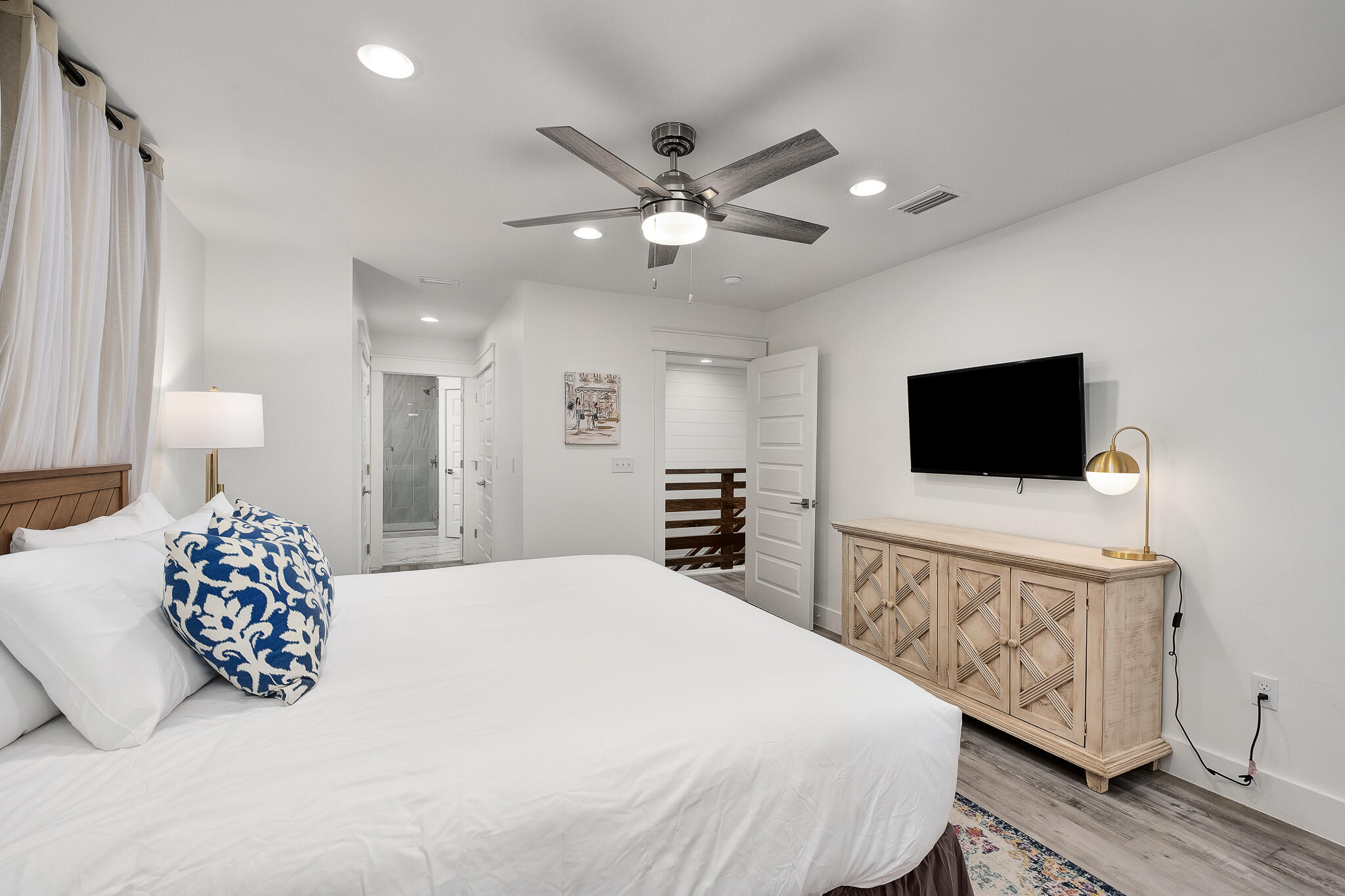 66 Seabreeze Trail Inlet Beach, FL 32461 - Photo 40 of 59 a bedroom with a bed and a flat screen tv