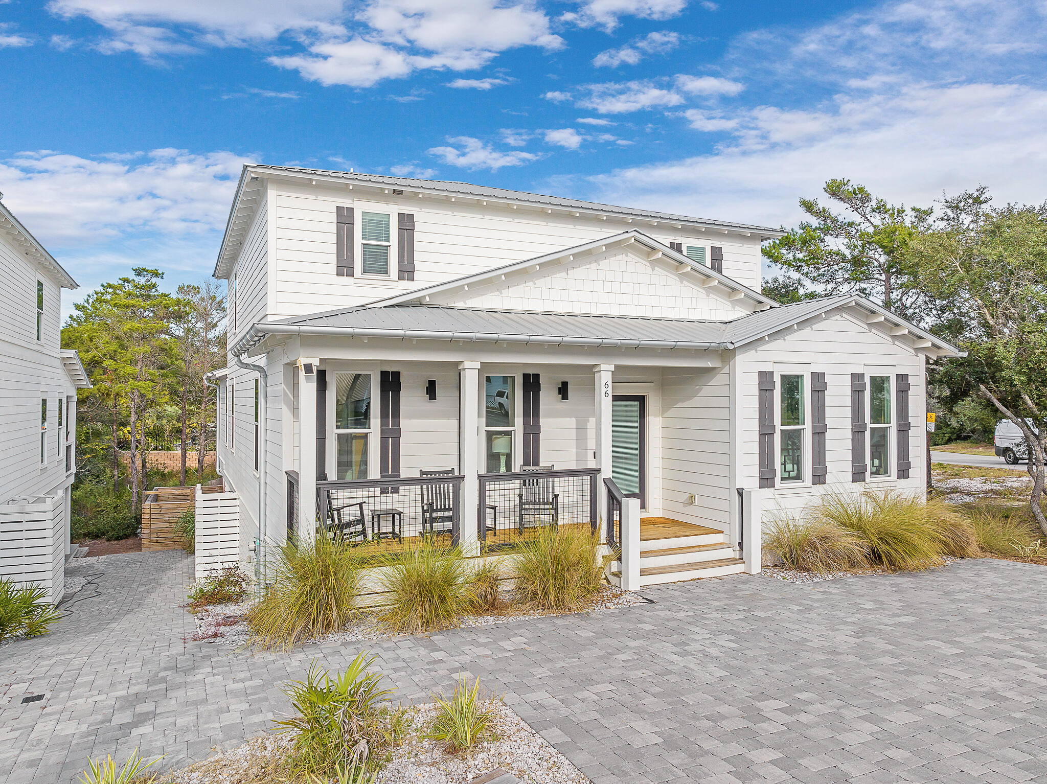 66 Seabreeze Trail Inlet Beach, FL 32461 - Photo 56 of 59 a front view of a house with a yard
