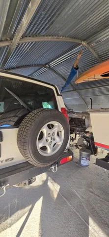 a view of swimming pool with outdoor seating