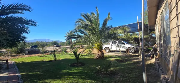 a view of a backyard with a patio