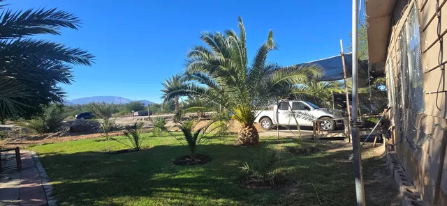 a view of a backyard with a patio