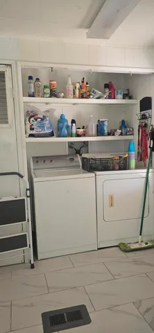 a view of a porch with furniture