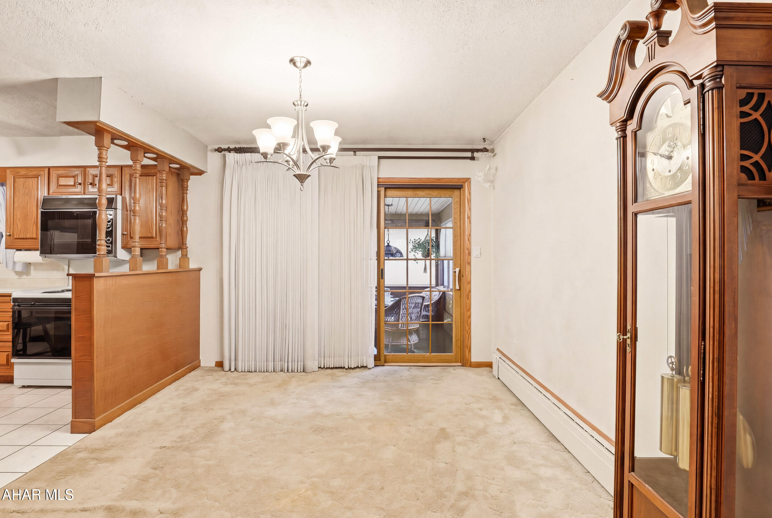 506 Ruby Street Windber, PA 15963 - Photo 13 of 38 a view of a livingroom with a chandelier