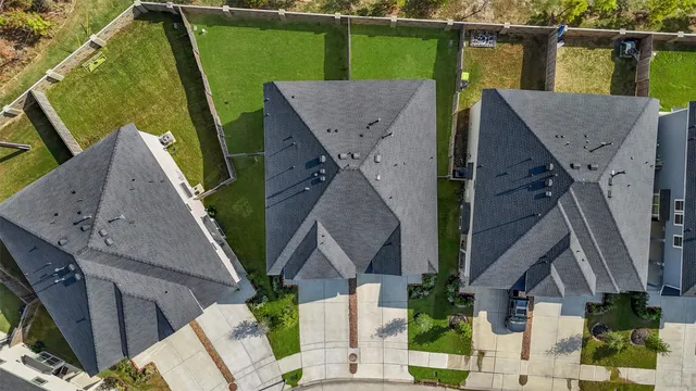 a picture of a bench in front of gate