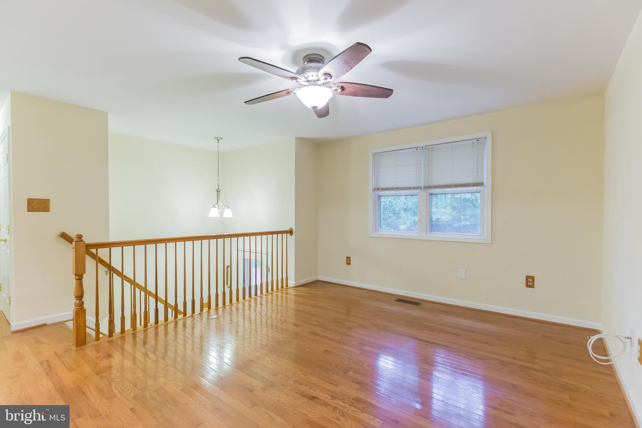 5240 Bayside Road Chesapeake Beach, MD 20732 - Photo 5 of 26 Main Level Family Room with Hardwood