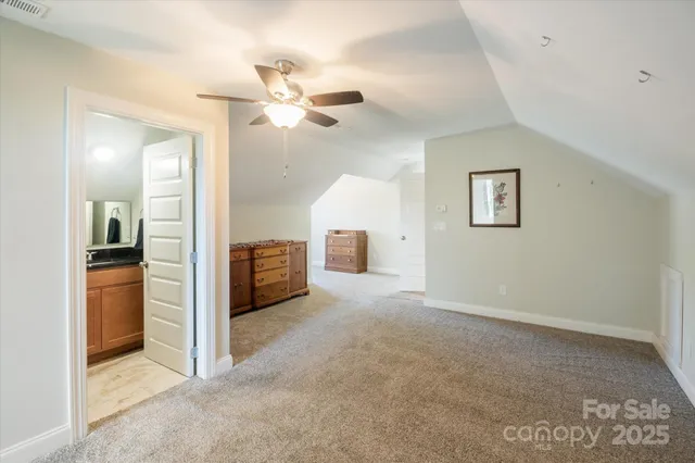 a view of a livingroom with a furniture