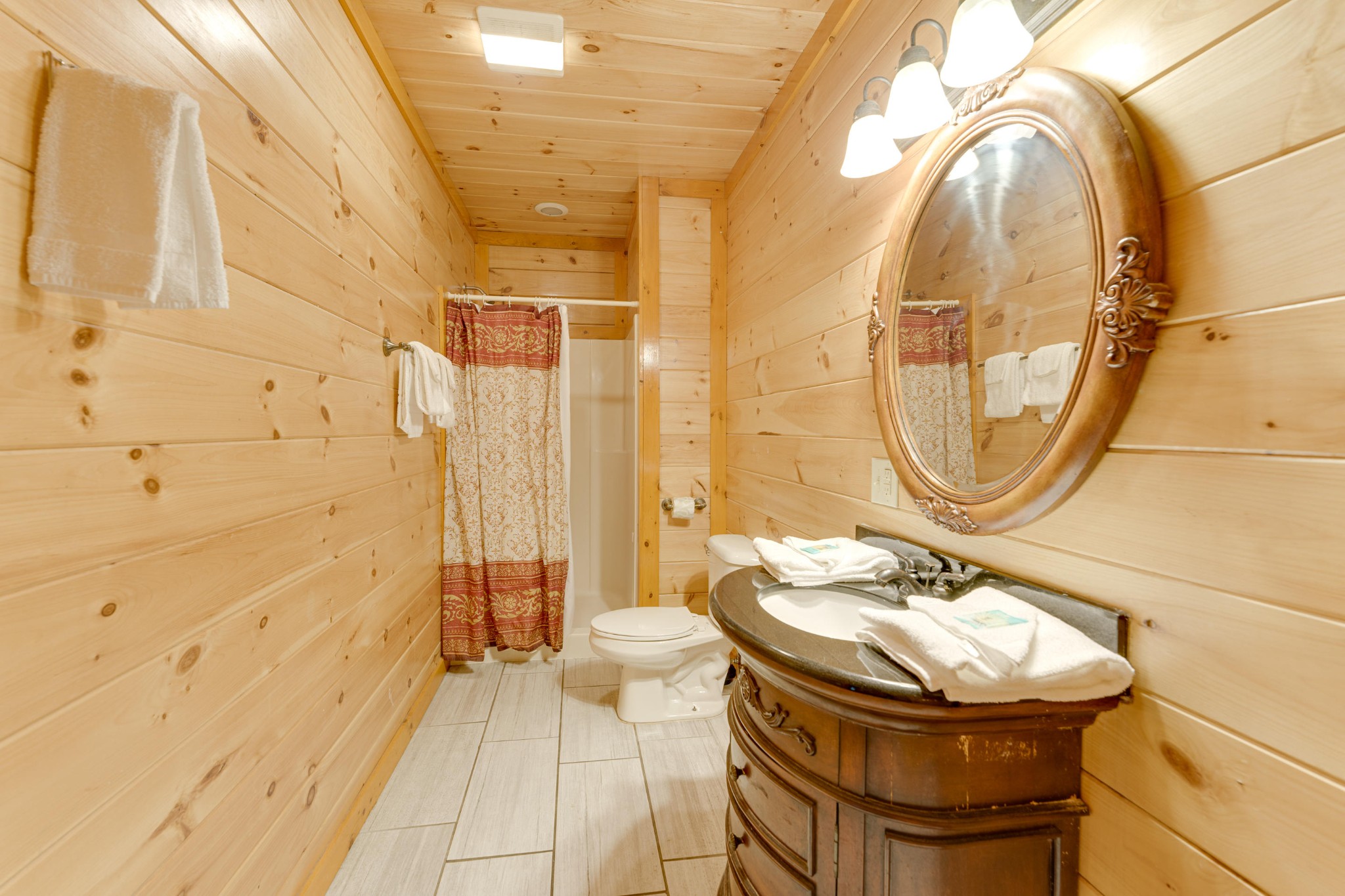 216 Amet Way Cosby, TN 37722 - Photo 15 of 21 a bathroom with a sink and a mirror