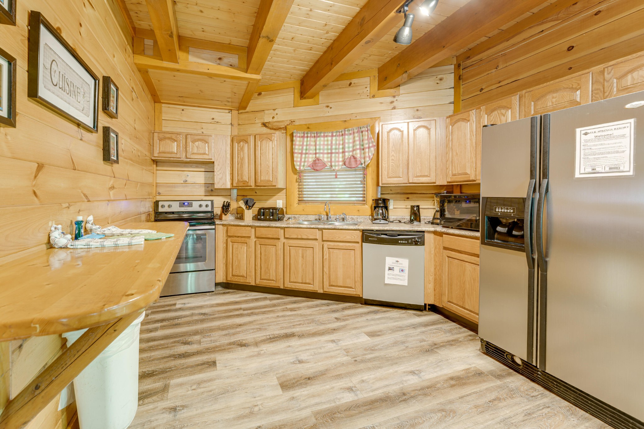 216 Amet Way Cosby, TN 37722 - Photo 5 of 21 a large kitchen with stainless steel appliances double cabinets and a counter top space