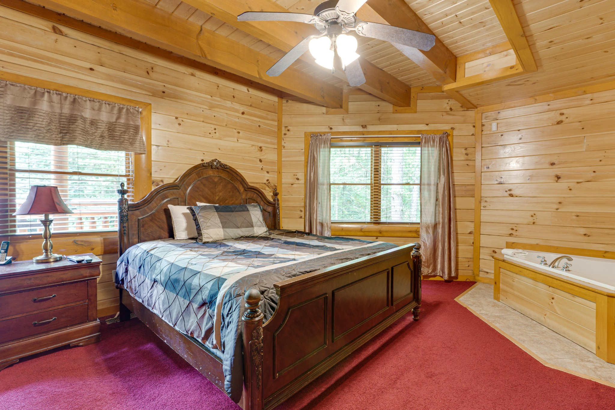 216 Amet Way Cosby, TN 37722 - Photo 7 of 21 a bedroom with a bed and a dresser next to a window