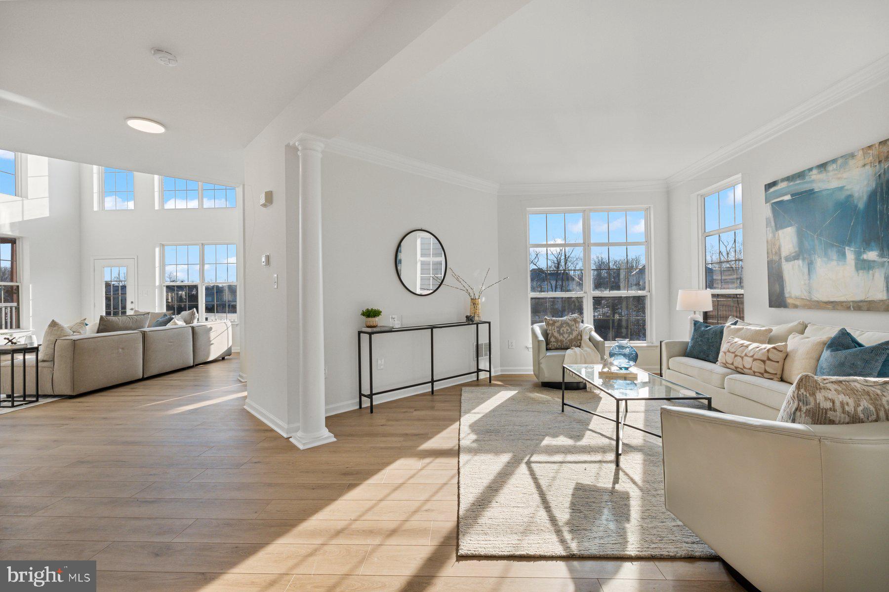 8329 Tillett Loop Manassas, VA 20110 - Photo 7 of 27 a living room with furniture and a large window