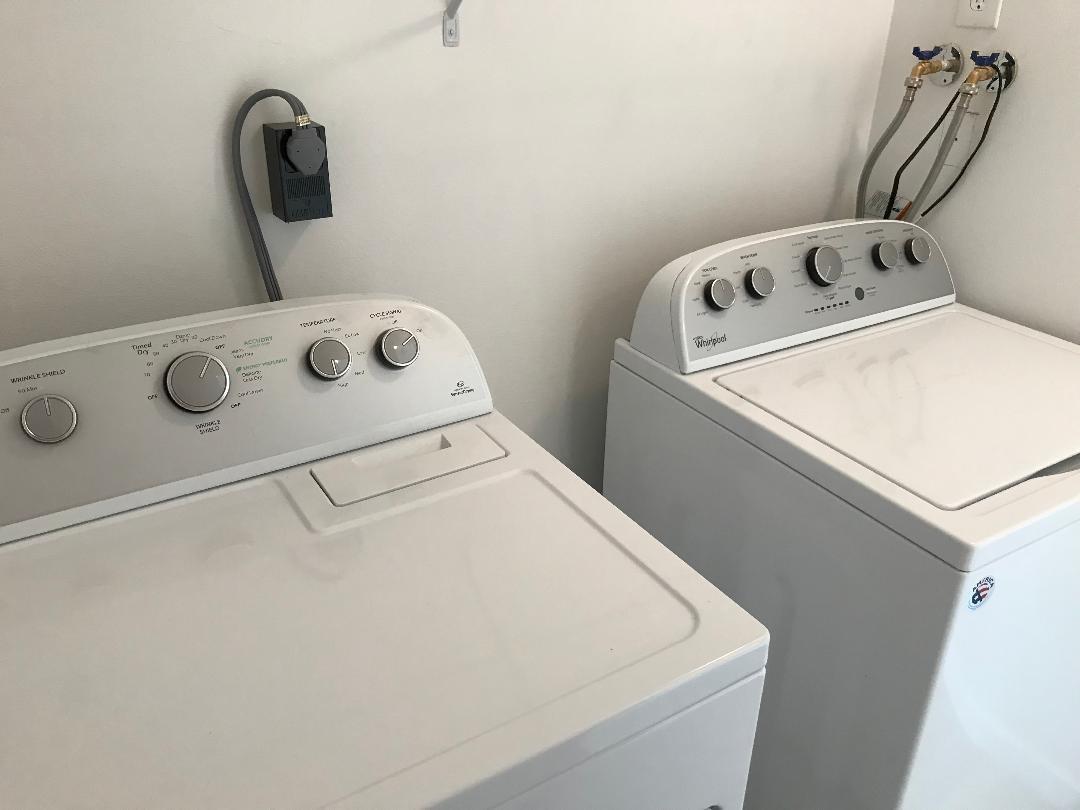 1387 High Point Way Northwest, Unit B Delray Beach, FL 33445 - Photo 14 of 16 a utility room with dryer and washer