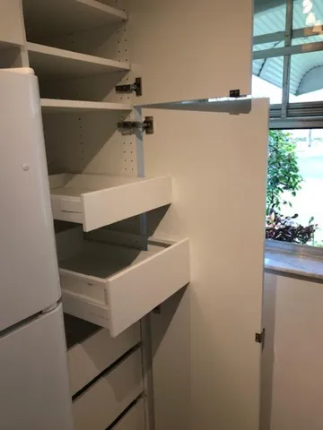 a view of storage and utility room with washer and dryer