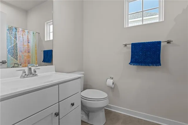 a stove top oven sitting inside of a kitchen