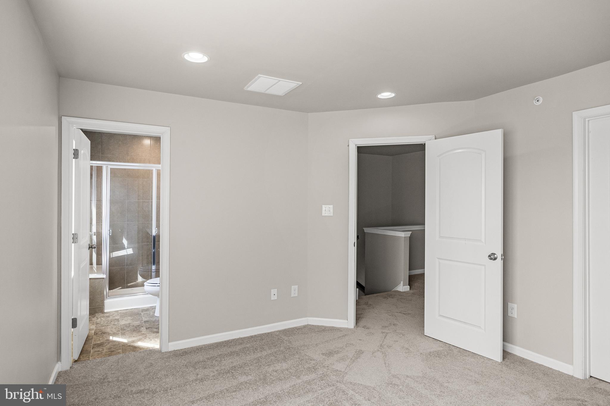 13 Iron Gate Road Sicklerville, NJ 08081 - Photo 22 of 25 a view of a hallway with a livingroom and a bathroom