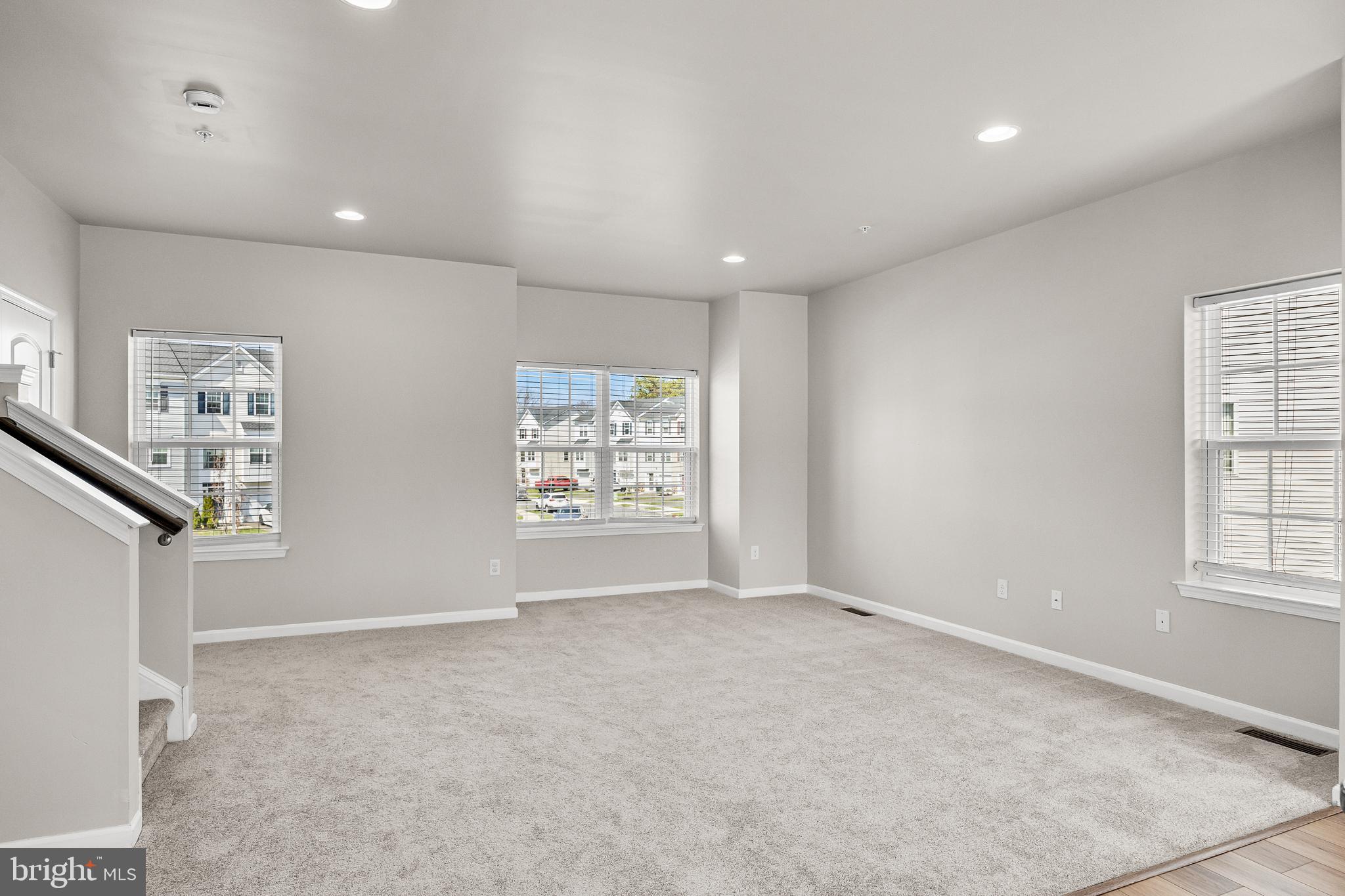 13 Iron Gate Road Sicklerville, NJ 08081 - Photo 7 of 25 a view of an empty room with a window