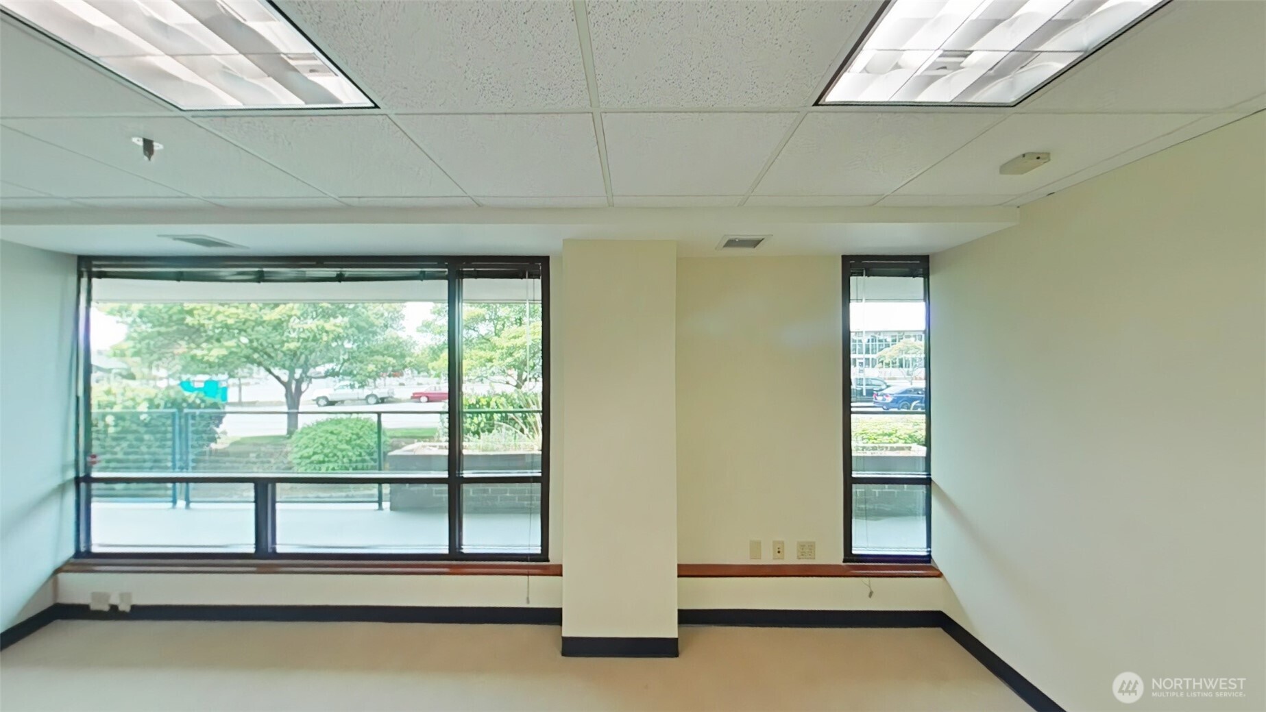 110 James Street, Unit 105 Edmonds, WA 98020 - Photo 12 of 23 a view of a room with large windows