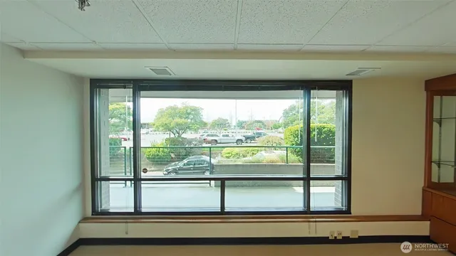 a view of a room that has a window