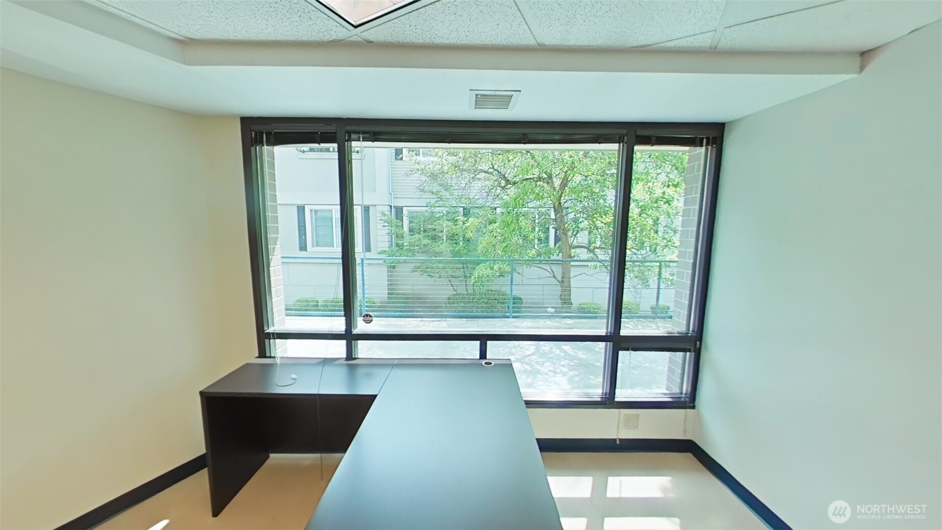 110 James Street, Unit 105 Edmonds, WA 98020 - Photo 9 of 23 a view of an empty room with a window