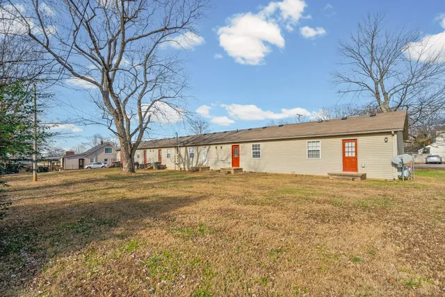 a view of a big yard with an outdoor space