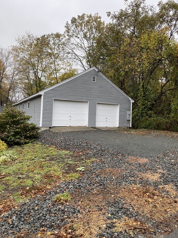 26 Hillside Road Montague, MA 01351 - Photo 2 of 12 a house that has a tree in front of it