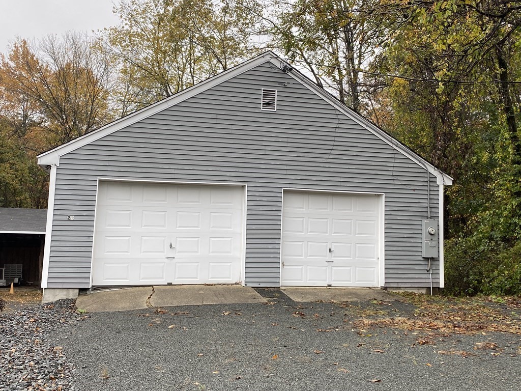 26 Hillside Road Montague, MA 01351 - Photo 3 of 12 a small white house with a outdoor space