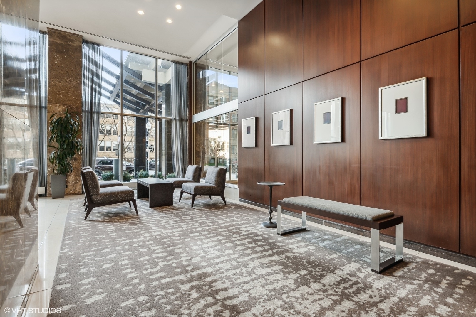 655 West Irving Park Road, Unit 1109 Chicago, IL 60613 - Photo 4 of 29 a living room with furniture and a large window