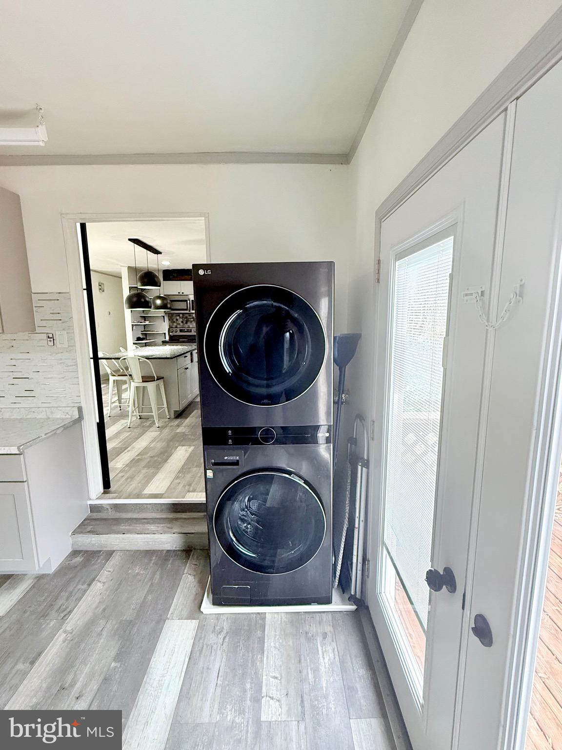 428 Buffalo Road Lusby, MD 20657 - Photo 13 of 20 a view of a storage and utility room with washer and dryer
