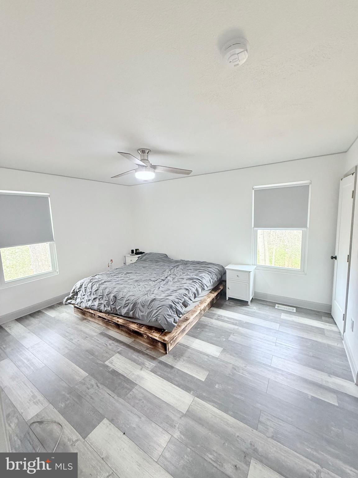 428 Buffalo Road Lusby, MD 20657 - Photo 19 of 20 a bedroom with a bed and a window