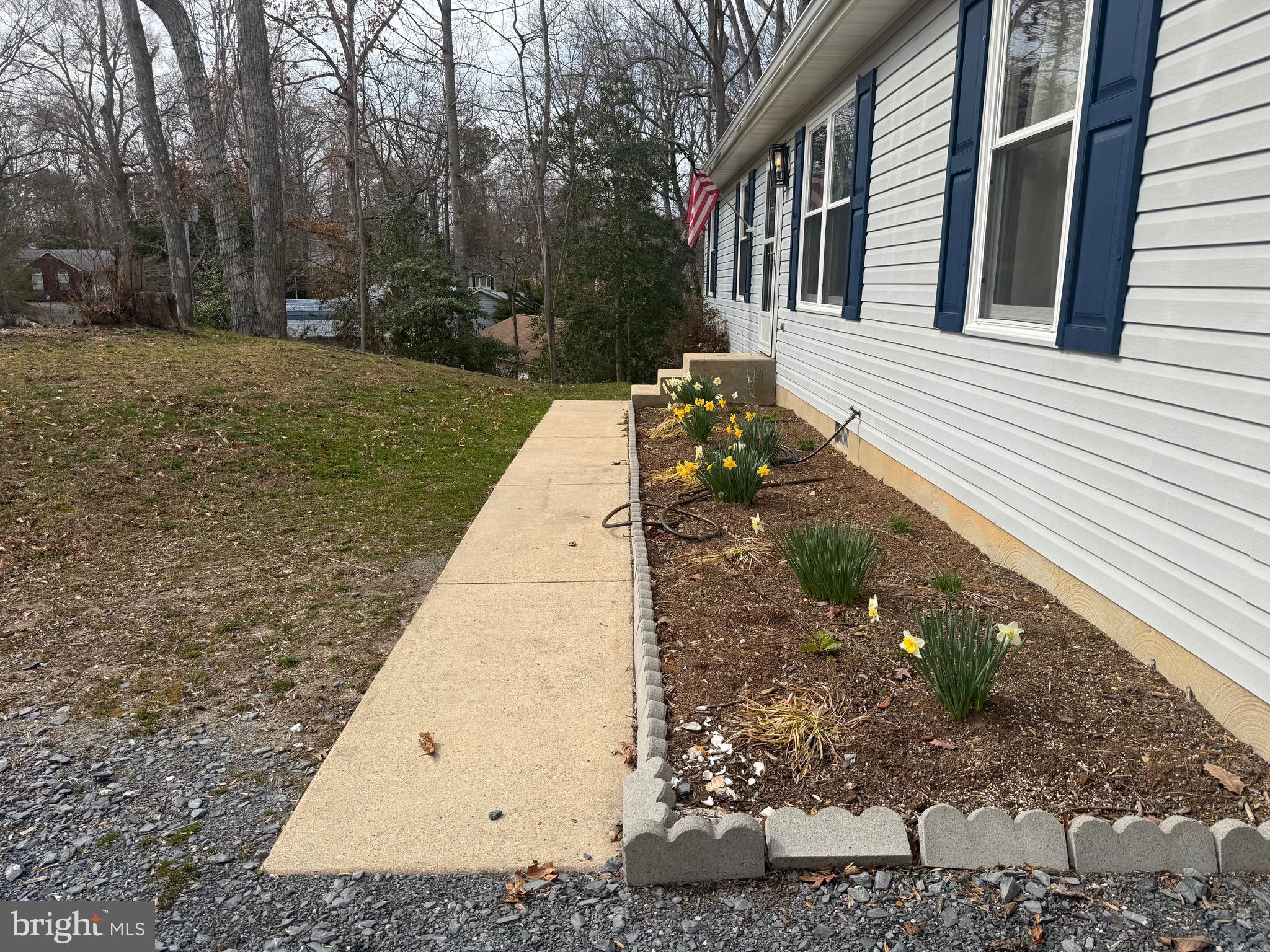 428 Buffalo Road Lusby, MD 20657 - Photo 3 of 20 a view of a house with backyard
