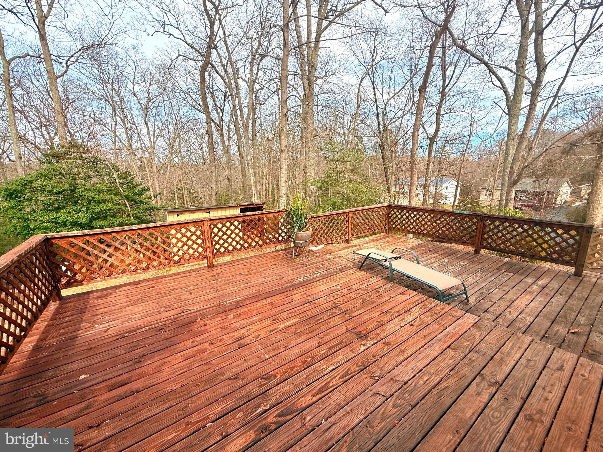 428 Buffalo Road Lusby, MD 20657 - Photo 5 of 20 a view of wooden floor and trees on the roof