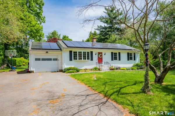 front view of a house with a patio