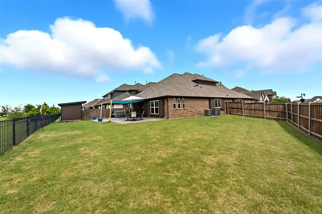a view of a large garden with large trees