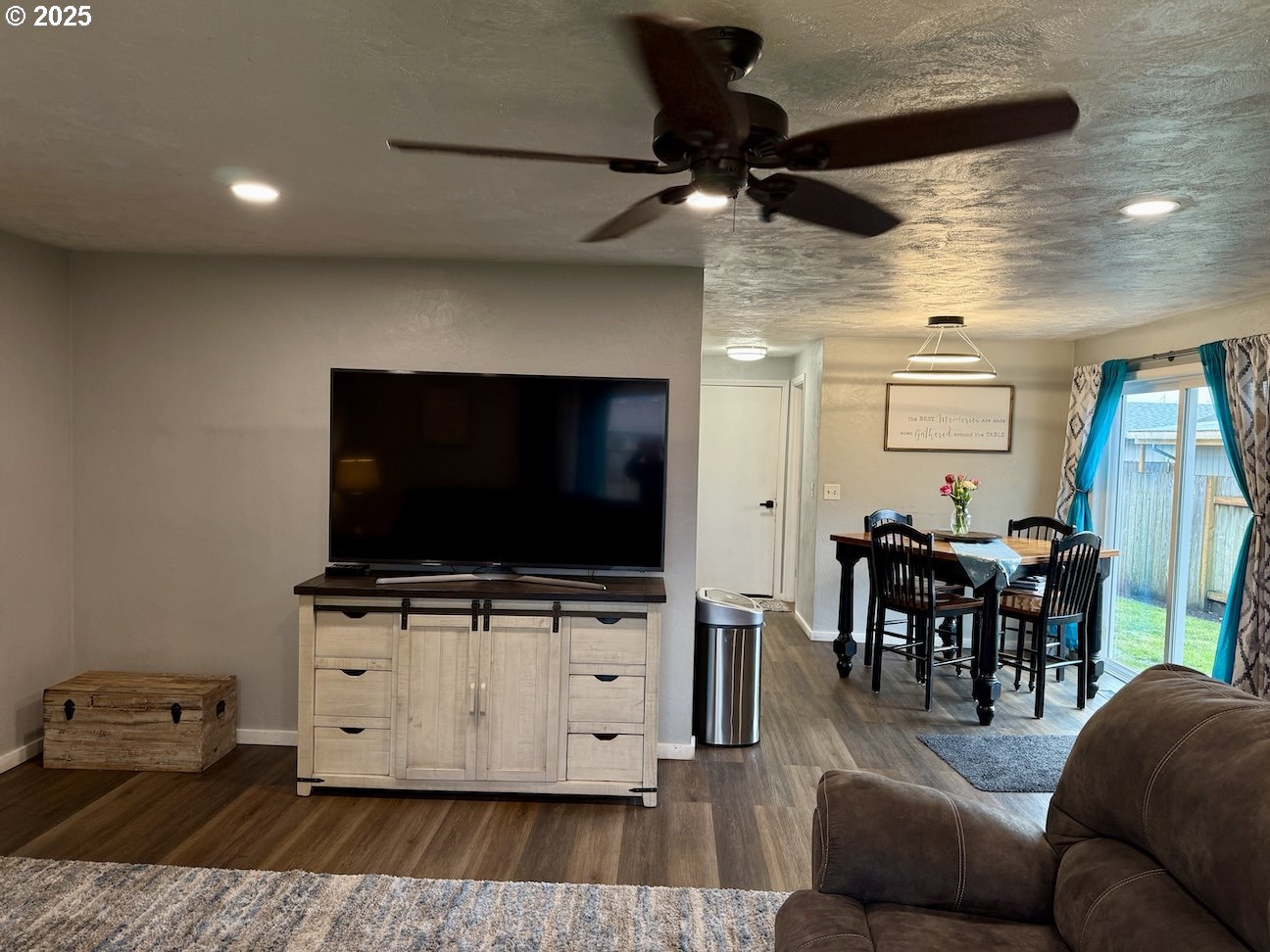 2172 8th Street Springfield, OR 97477 - Photo 12 of 34 a living room with furniture and a flat screen tv