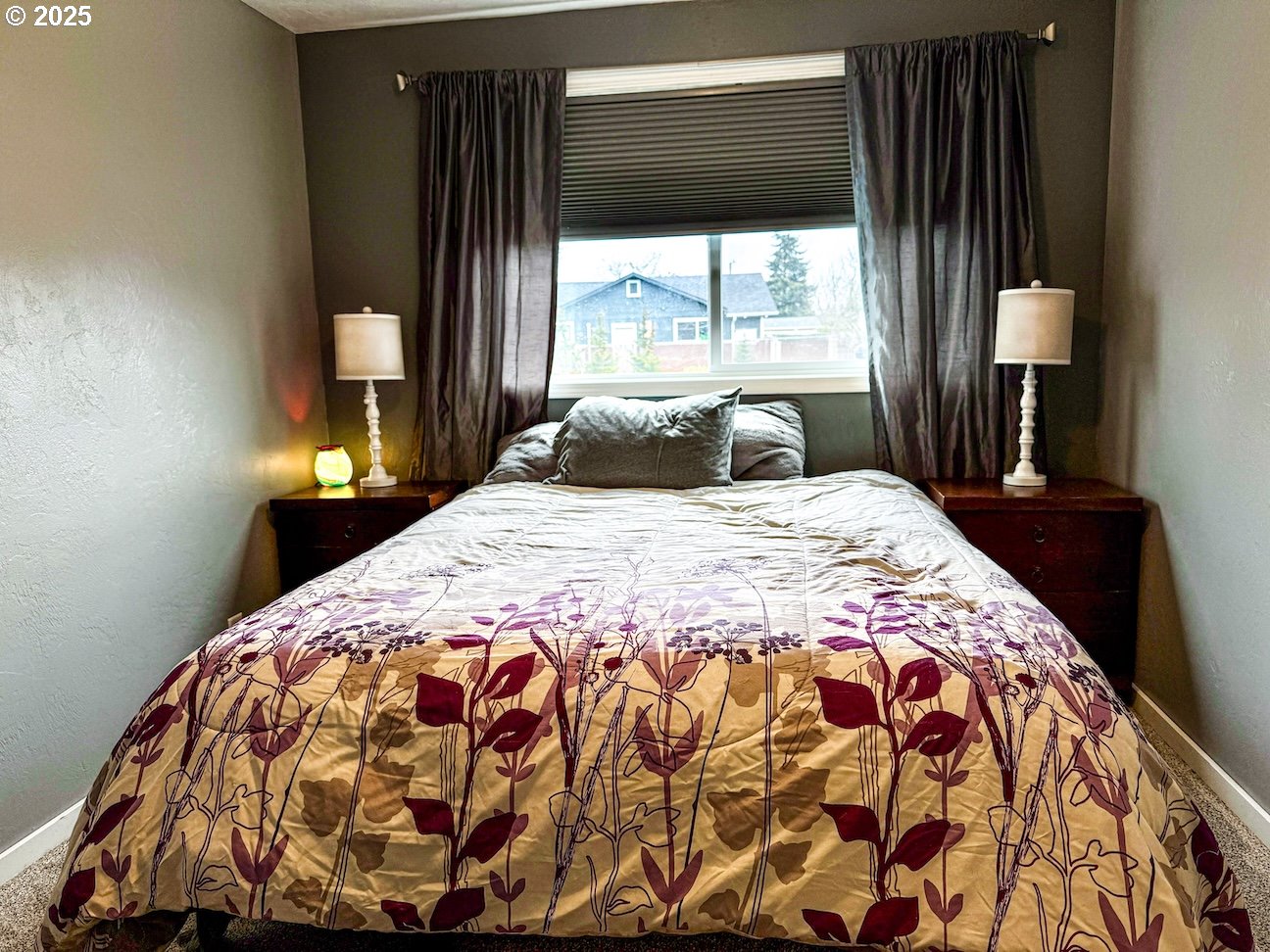 2172 8th Street Springfield, OR 97477 - Photo 25 of 34 a bedroom with a bed and large windows