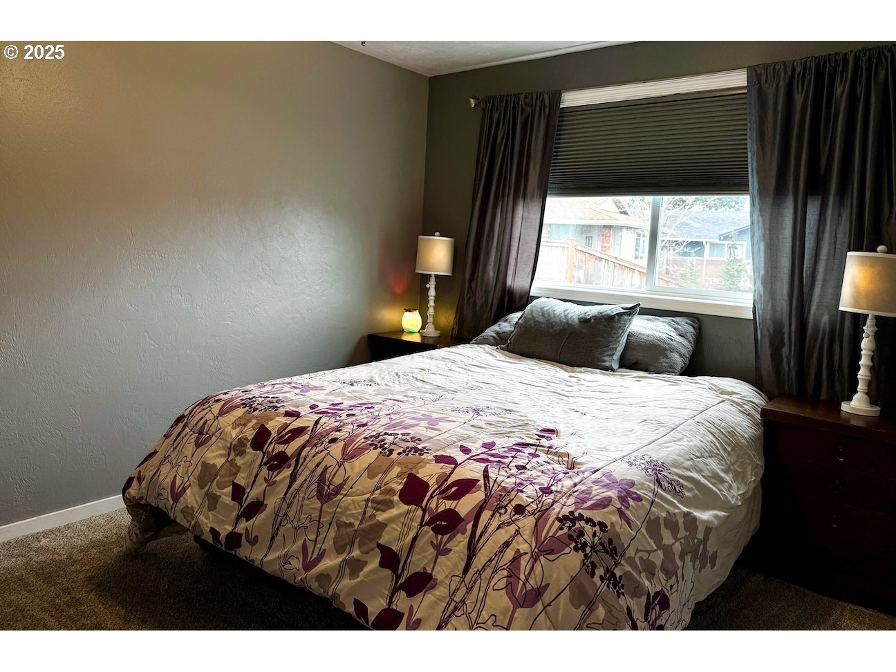 2172 8th Street Springfield, OR 97477 - Photo 28 of 34 a bedroom with a bed and a window
