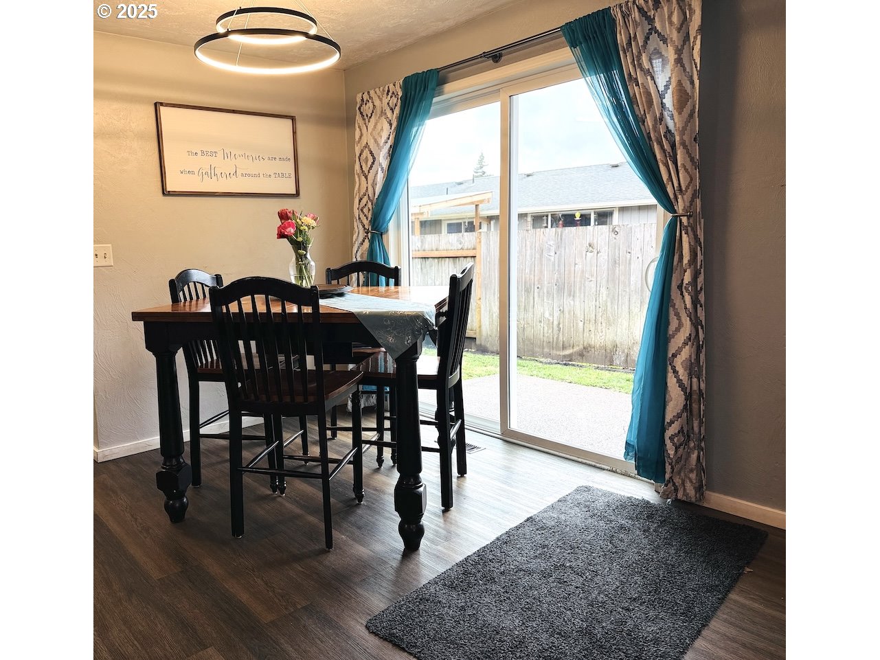 2172 8th Street Springfield, OR 97477 - Photo 10 of 34 a view of a dining room with furniture and wooden floor